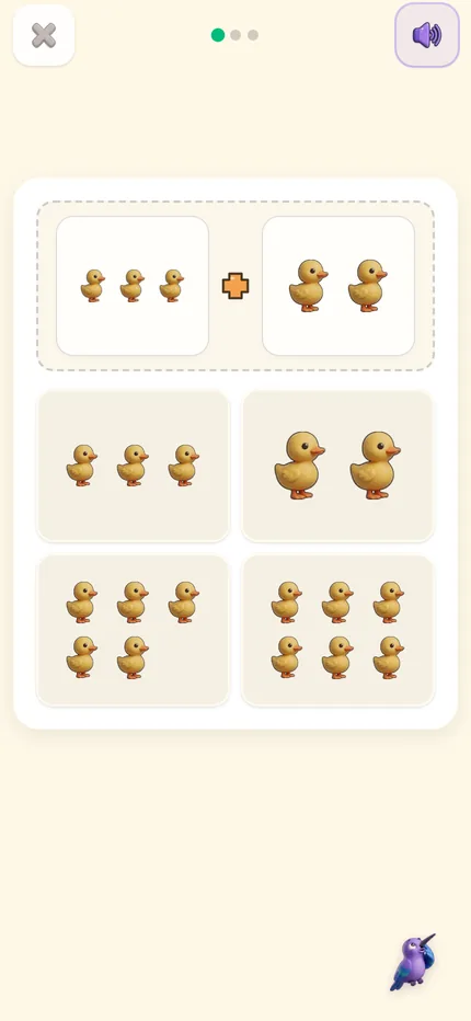 Un ejercicio de números en un teléfono: tres patitos más dos, y cuatro respuestas posibles para tocar la correcta.