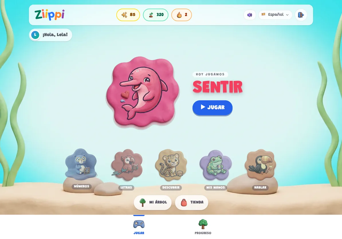 La pantalla de juego de Ziippi en una tablet: la mascota del día en el centro y, abajo, las islas de Números, Letras, Descubrir, Mis manos y Hablar.